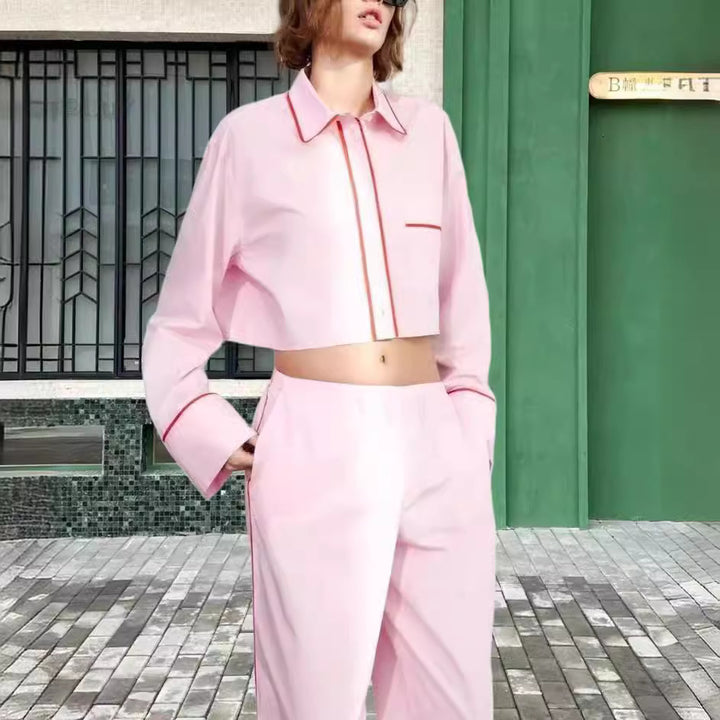 Damer modernt tvådelat set med crop-top och vida byxor Mirla-Eva Jonsson