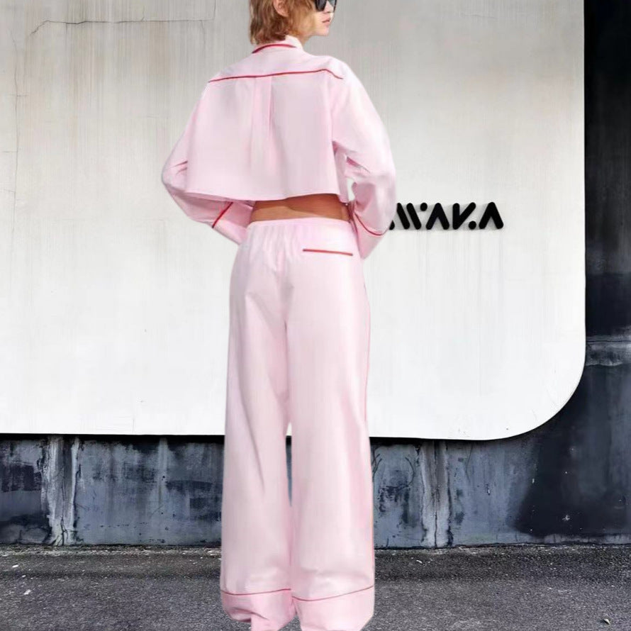 Damer modernt tvådelat set med crop-top och vida byxor Mirla-Eva Jonsson