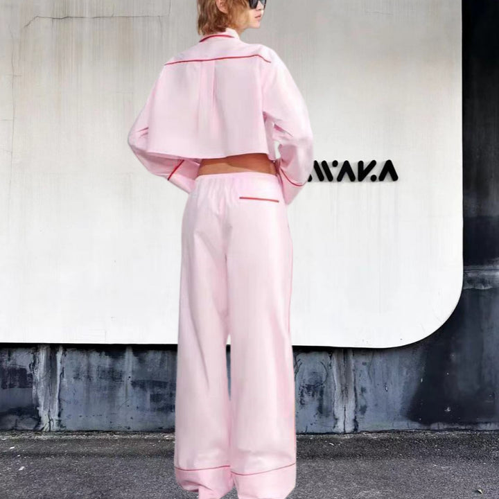 Damer modernt tvådelat set med crop-top och vida byxor Mirla-Eva Jonsson