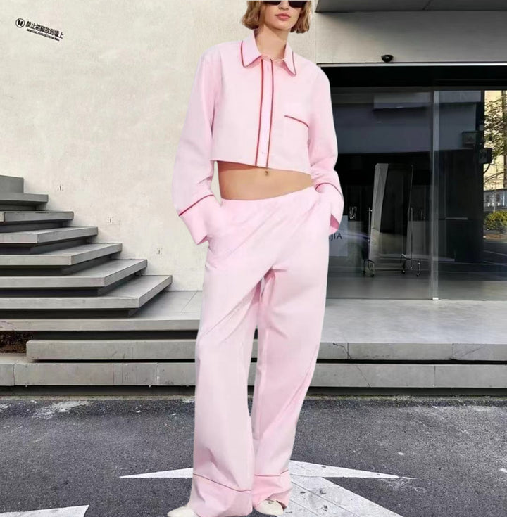 Damer modernt tvådelat set med crop-top och vida byxor Mirla-Eva Jonsson