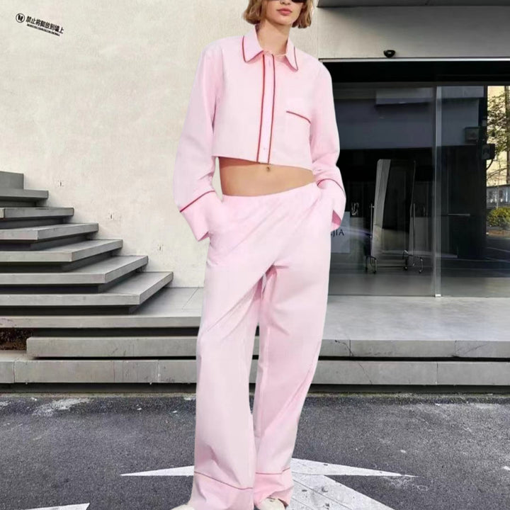 Damer modernt tvådelat set med crop-top och vida byxor Mirla-Eva Jonsson