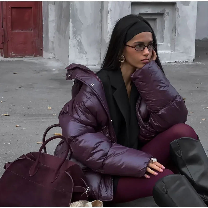 Damer modetrend oversized dunjacka med midjebälte och sidofickor Mirla-Eva Jonsson
