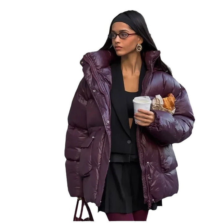 Damer modetrend oversized dunjacka med midjebälte och sidofickor Mirla-Eva Jonsson