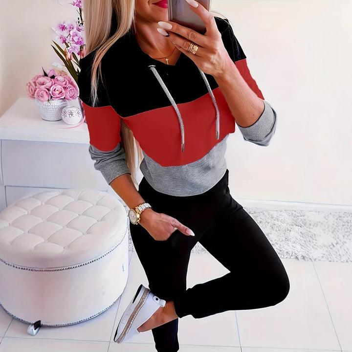 Damer modig fritidströja med huva och färgblockdesign Mirla-Eva Jonsson