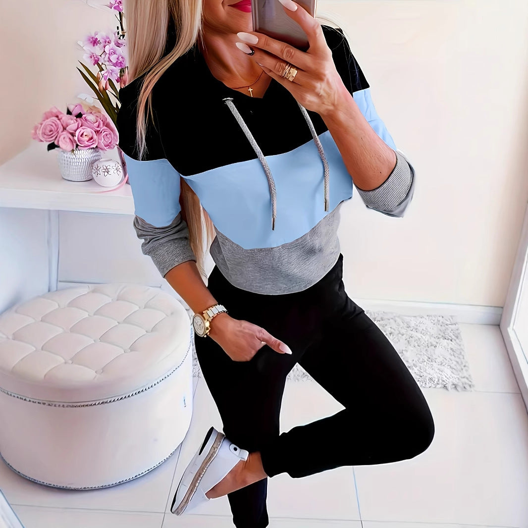 Damer modig fritidströja med huva och färgblockdesign Mirla-Eva Jonsson