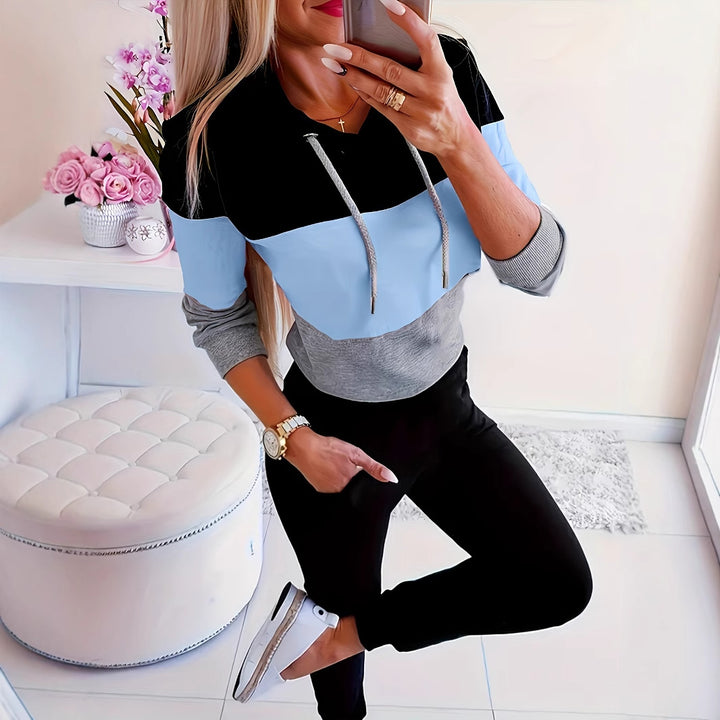 Damer modig fritidströja med huva och färgblockdesign Mirla-Eva Jonsson