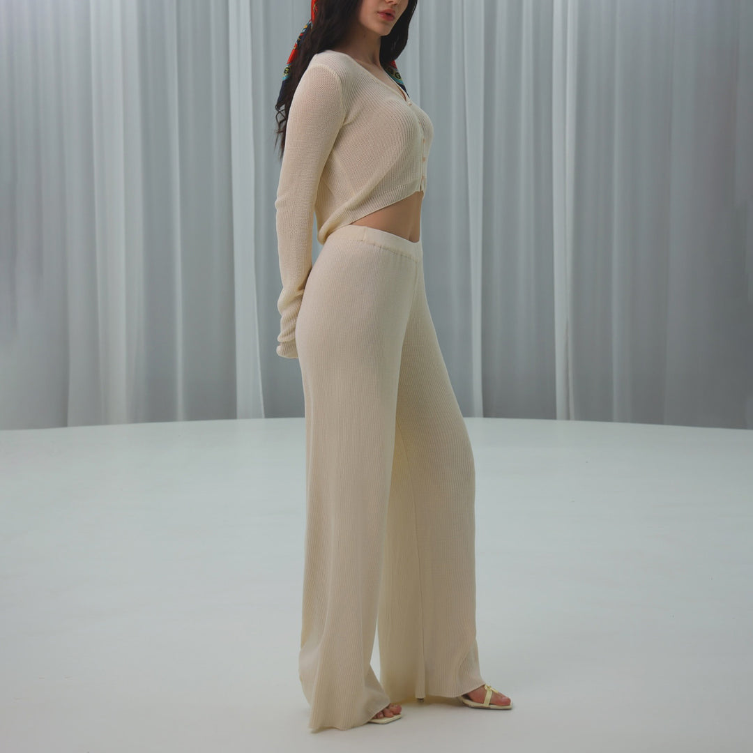 Damer modig och bekväm stickad ensemble med cropped topp och vida byxben Mirla-Eva Jonsson