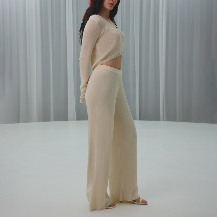 Damer modig och bekväm stickad ensemble med cropped topp och vida byxben Mirla-Eva Jonsson