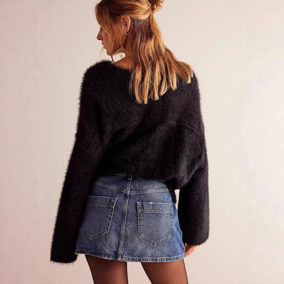 Damer modisch A-linjig denimkjol med asymmetrisk knapdesign och praktiska fickor Mirla-Eva Jonsson