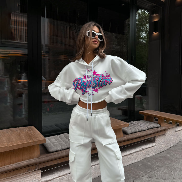 Damer modisch cropped hoodie med färggladtryck Mirla-Eva Jonsson
