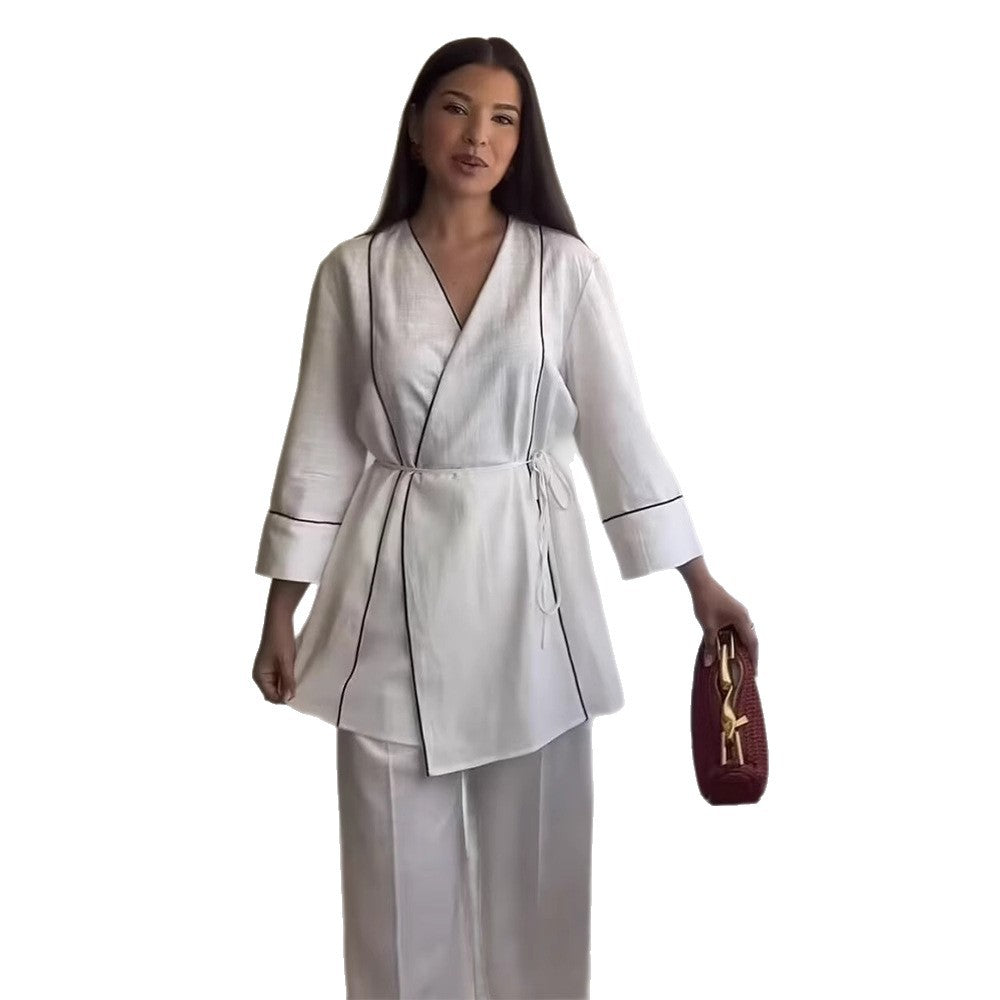 Damer modische Wickeljacka med eleganta detaljer Mirla-Eva Jonsson