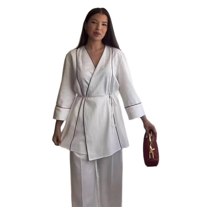 Damer modische Wickeljacka med eleganta detaljer Mirla-Eva Jonsson
