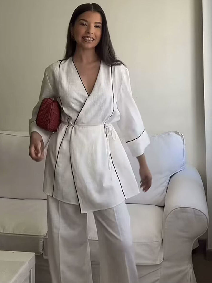 Damer modische Wickeljacka med eleganta detaljer Mirla-Eva Jonsson