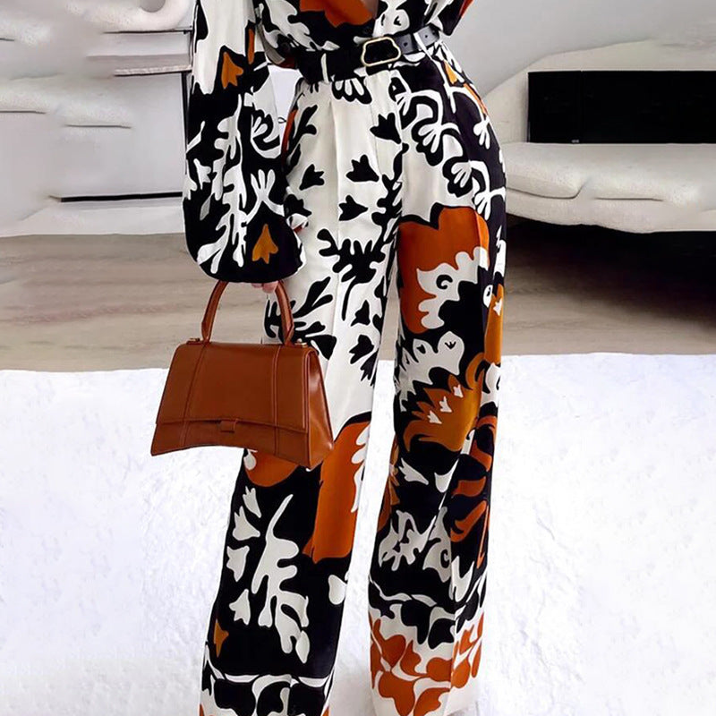Damer modischer Jumpsuit med dramatiska puffärmar och bälte Mirla-Eva Jonsson