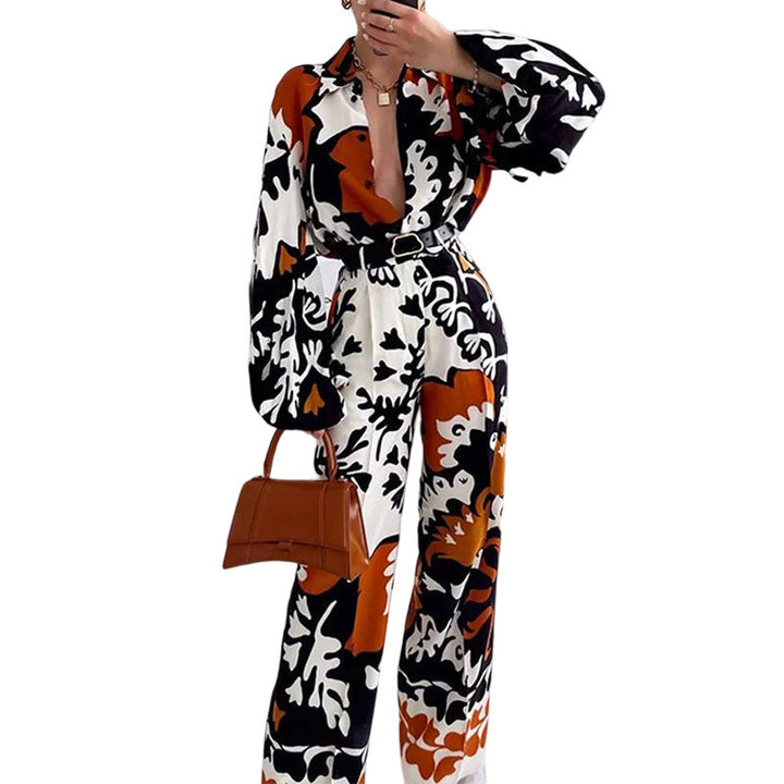 Damer modischer Jumpsuit med dramatiska puffärmar och bälte Mirla-Eva Jonsson