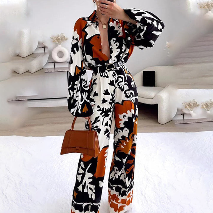 Damer modischer Jumpsuit med dramatiska puffärmar och bälte Mirla-Eva Jonsson