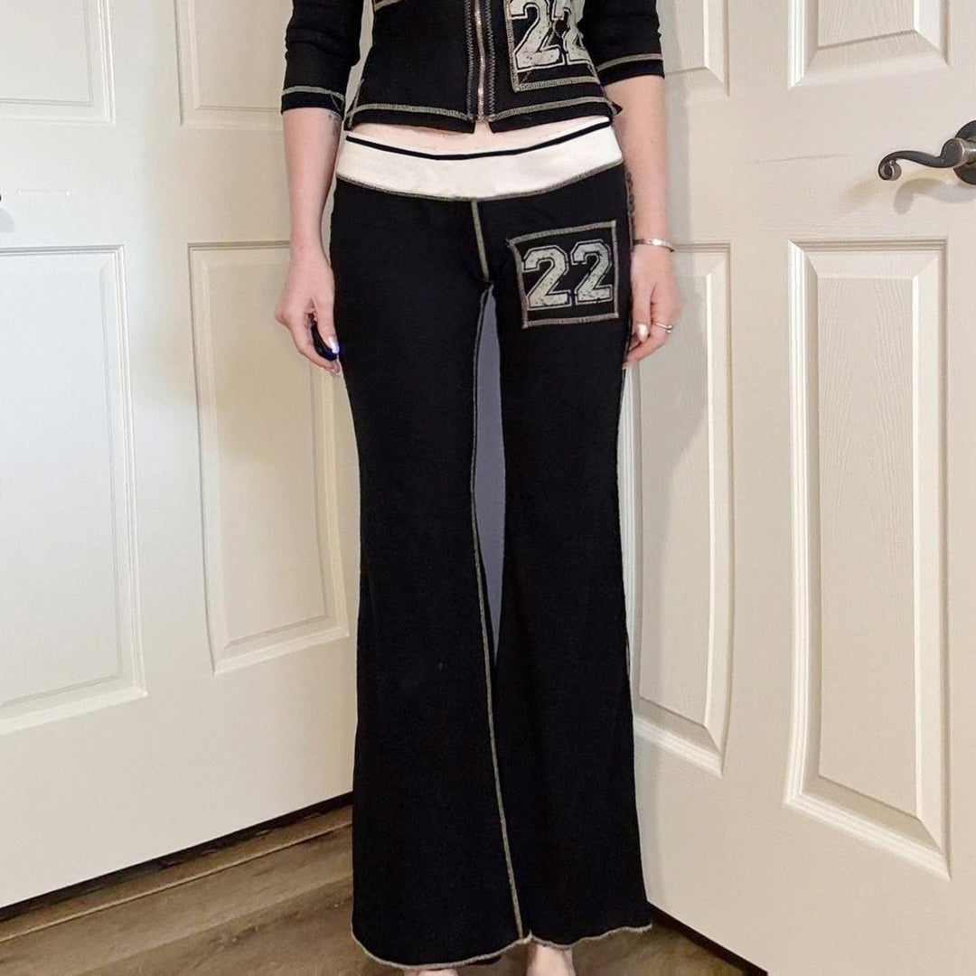 Damer modisk bootcut-byxa med elastisk midja och sportiga applikationer Mirla-Eva Jonsson