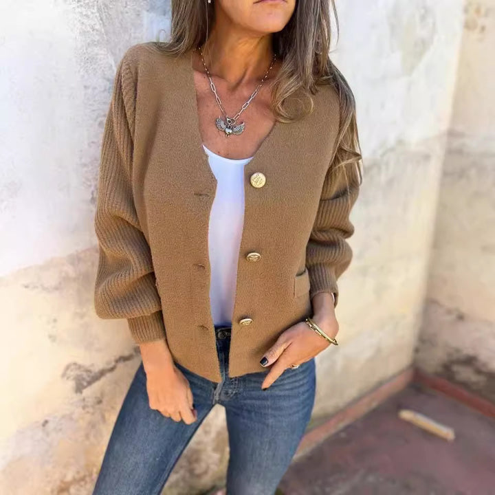 Damer modisk cardigan med knäppdetaljer och fickor Mirla-Eva Jonsson