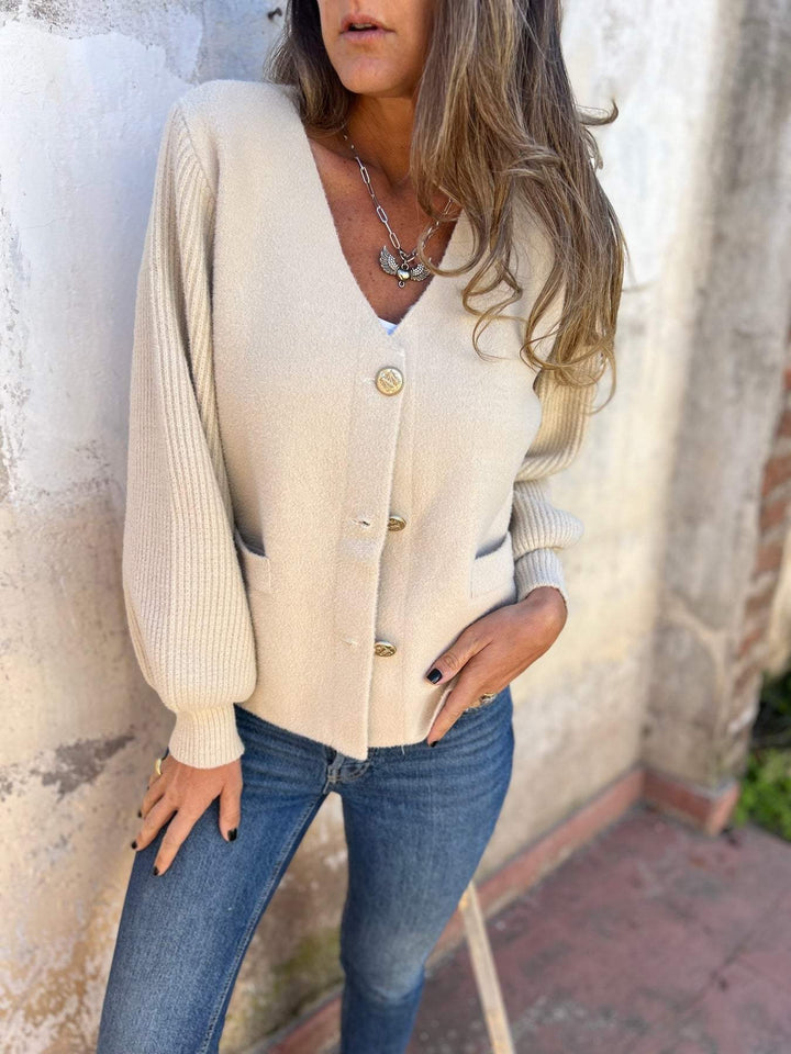Damer modisk cardigan med knäppdetaljer och fickor Mirla-Eva Jonsson