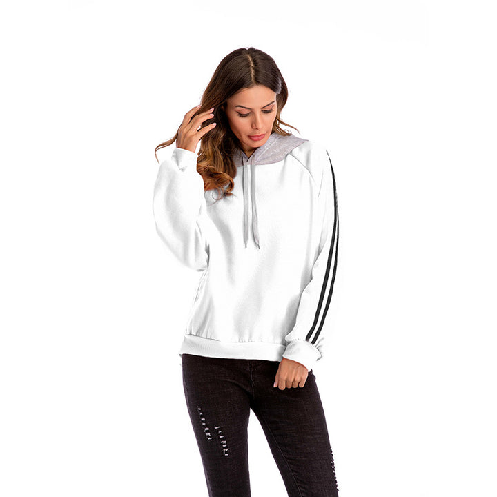 Damer modisk hoodie med kontrasterande ärmar och avslappnad passform Mirla-Eva Jonsson