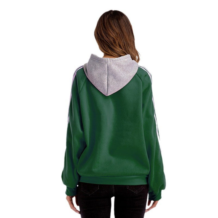 Damer modisk hoodie med kontrasterande ärmar och avslappnad passform Mirla-Eva Jonsson