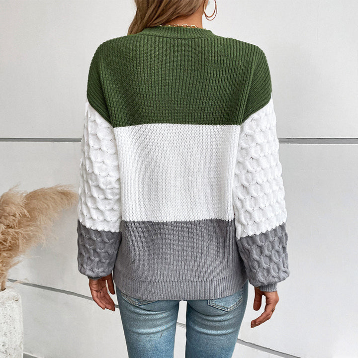 Damer modisk tröja med strukturerade ärmar och blockränder Mirla-Eva Jonsson