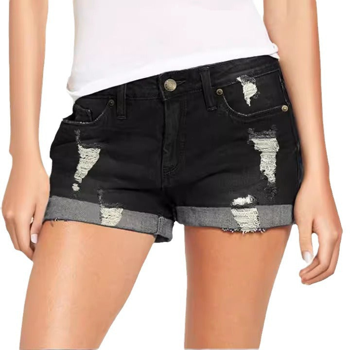 Damer modiska Destroyed Denim-shorts med uppvikta fållar Mirla-Eva Jonsson