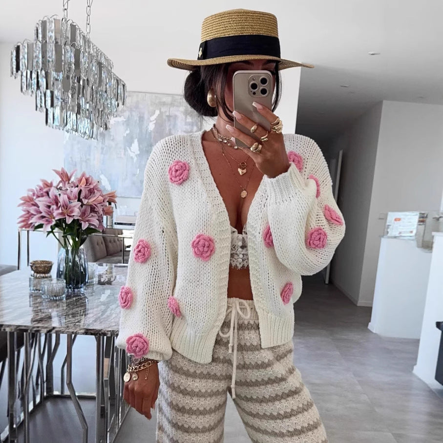 Damer mysig stickad cardigan med lekfulla blomapplikationer Mirla-Eva Jonsson
