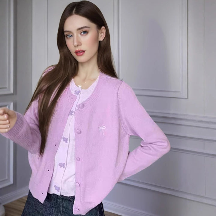 Damer mysig stickad jacka med dekorativa rosetter Mirla-Eva Jonsson