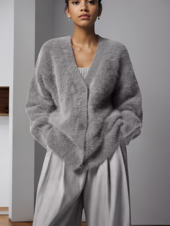 Damer mysig stickad jacka med oversized passform och stora knappar Mirla-Eva Jonsson