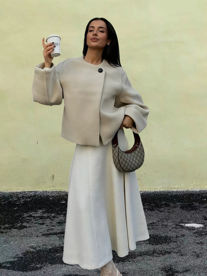 Damer omslagsjacka med vida ärmar och dekorativ knapp Mirla-Eva Jonsson