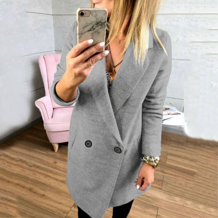 Damer överlång, figursydd kappa med elegant slag och praktiska fickor Mirla-Eva Jonsson