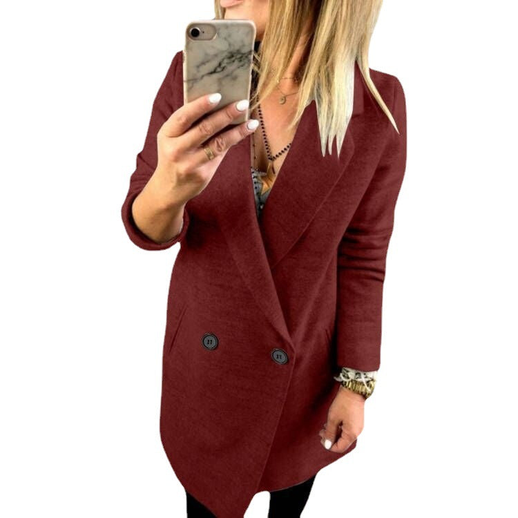 Damer överlång, figursydd kappa med elegant slag och praktiska fickor Mirla-Eva Jonsson