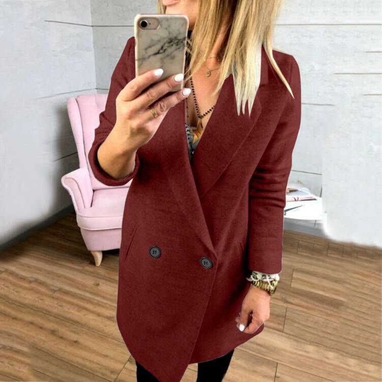 Damer överlång, figursydd kappa med elegant slag och praktiska fickor Mirla-Eva Jonsson