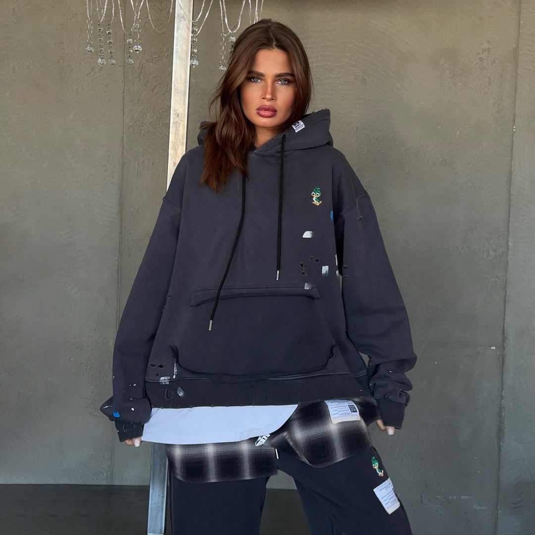 Damer oversized Hoodie med unika detaljer och avslappnad passform Mirla-Eva Jonsson