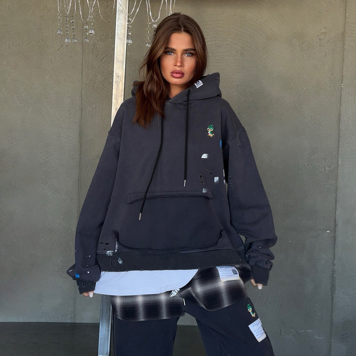 Damer oversized Hoodie med unika detaljer och avslappnad passform Mirla-Eva Jonsson