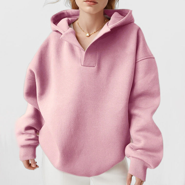 Damer oversized hoodie med innovativ krage Mirla-Eva Jonsson