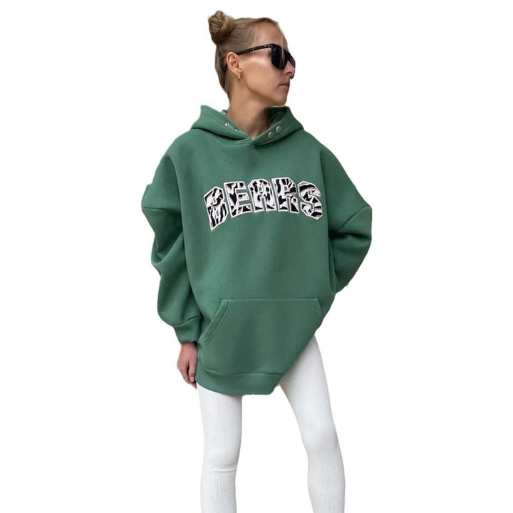 Damer oversized hoodie med kreativ grafisk design Mirla-Eva Jonsson