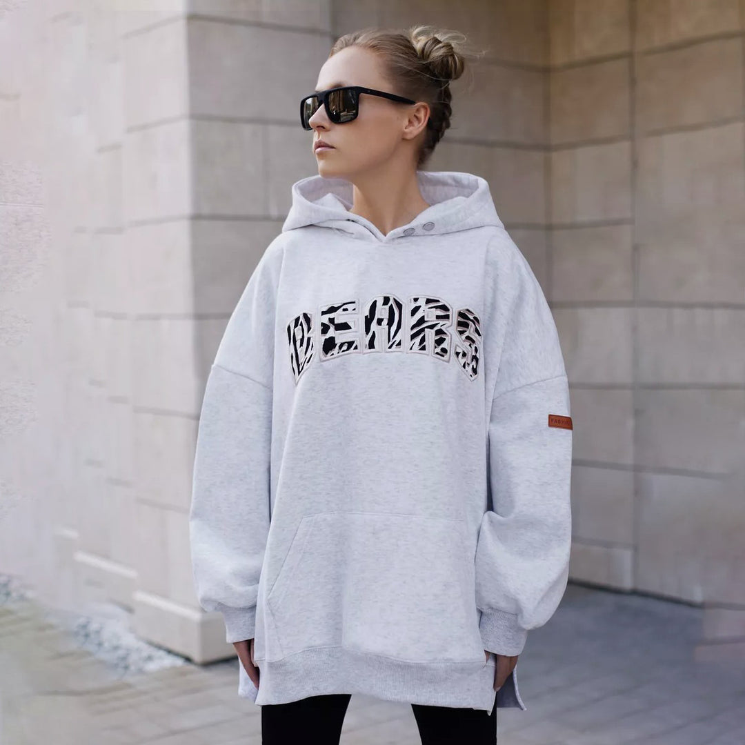 Damer oversized hoodie med kreativ grafisk design Mirla-Eva Jonsson