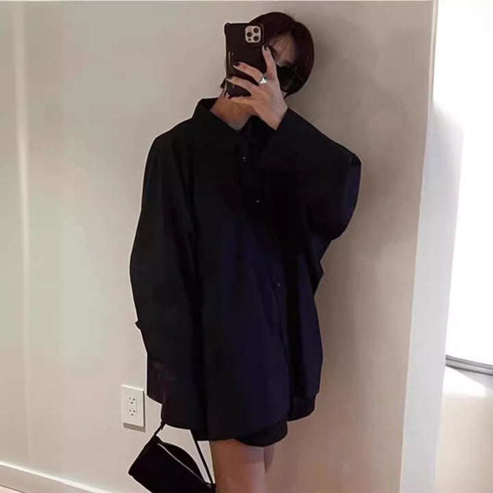 Damer oversized skjorta blus med klassisk krage och sidficka Mirla-Eva Jonsson
