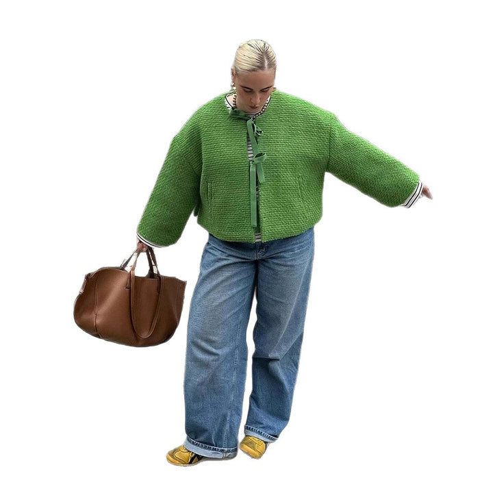 Damer oversized stickad jacka med dekorativt knyt-detail Mirla-Eva Jonsson