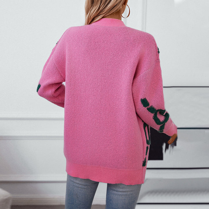 Damer oversized stickad jacka med iögonfallande design och knappar Mirla-Eva Jonsson