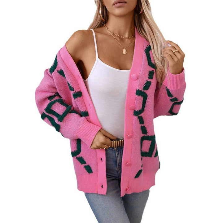 Damer oversized stickad jacka med iögonfallande design och knappar Mirla-Eva Jonsson