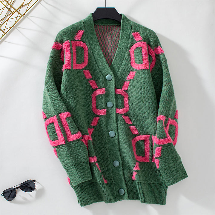 Damer oversized stickad jacka med iögonfallande design och knappar Mirla-Eva Jonsson