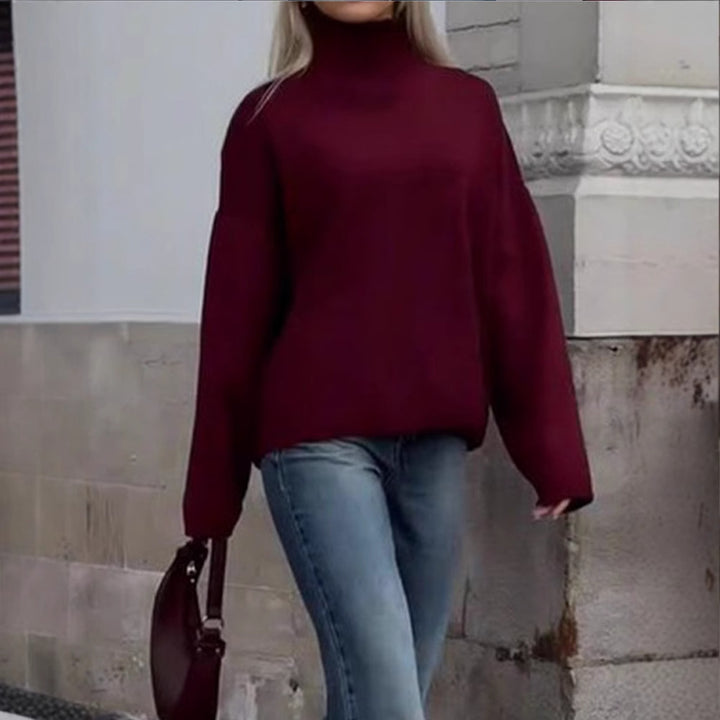 Damer oversized stickad tröja med hög krage och avslappnad passform Mirla-Eva Jonsson