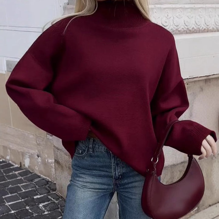 Damer oversized stickad tröja med hög krage och avslappnad passform Mirla-Eva Jonsson
