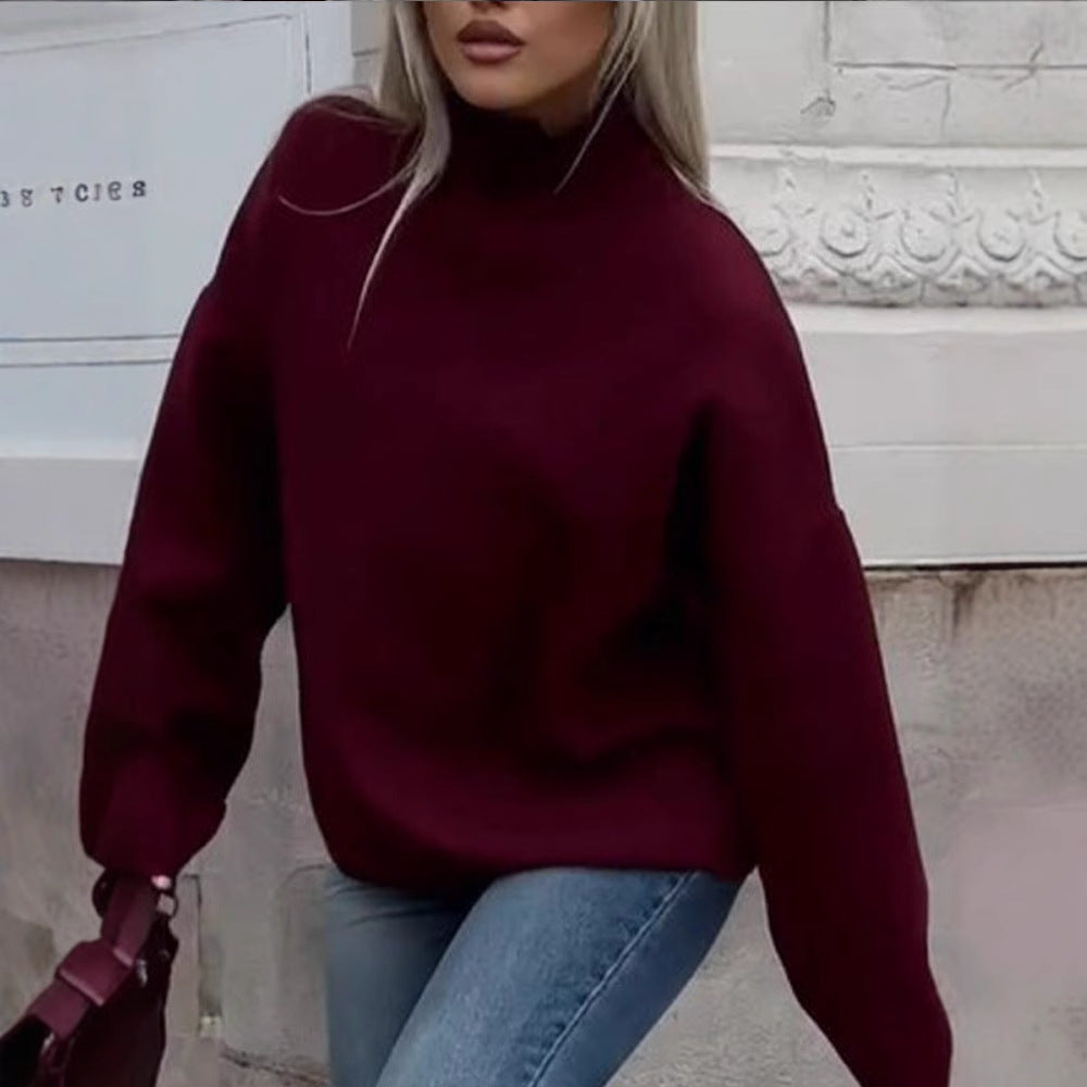 Damer oversized stickad tröja med hög krage och avslappnad passform Mirla-Eva Jonsson