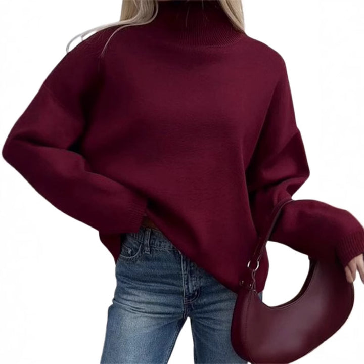 Damer oversized stickad tröja med hög krage och avslappnad passform Mirla-Eva Jonsson
