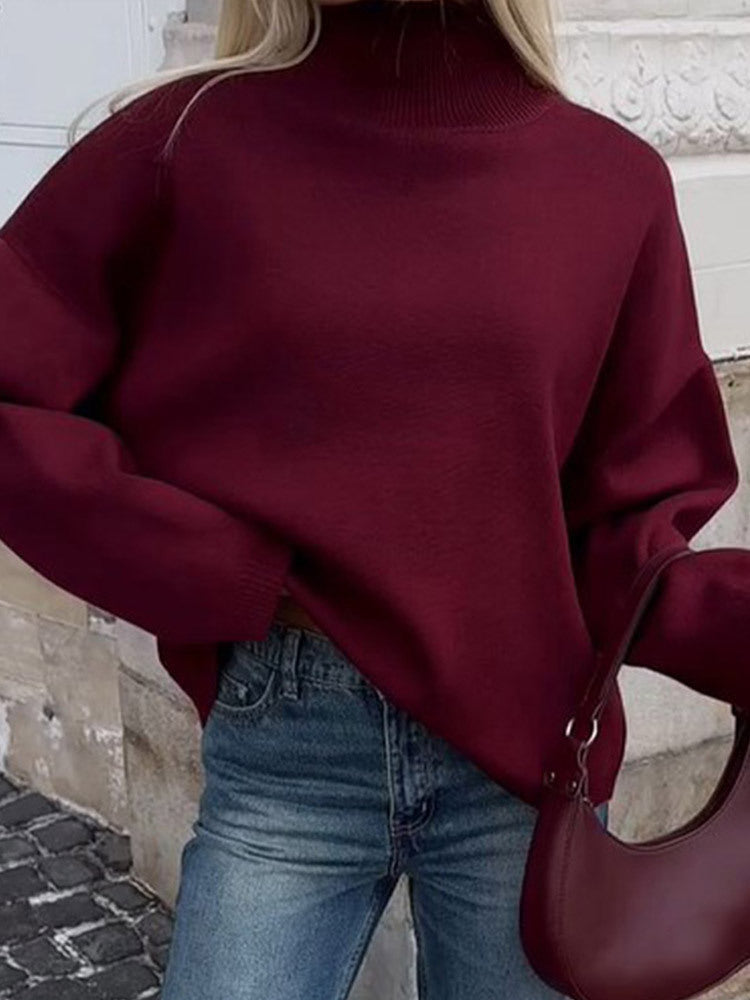 Damer oversized stickad tröja med hög krage och avslappnad passform Mirla-Eva Jonsson