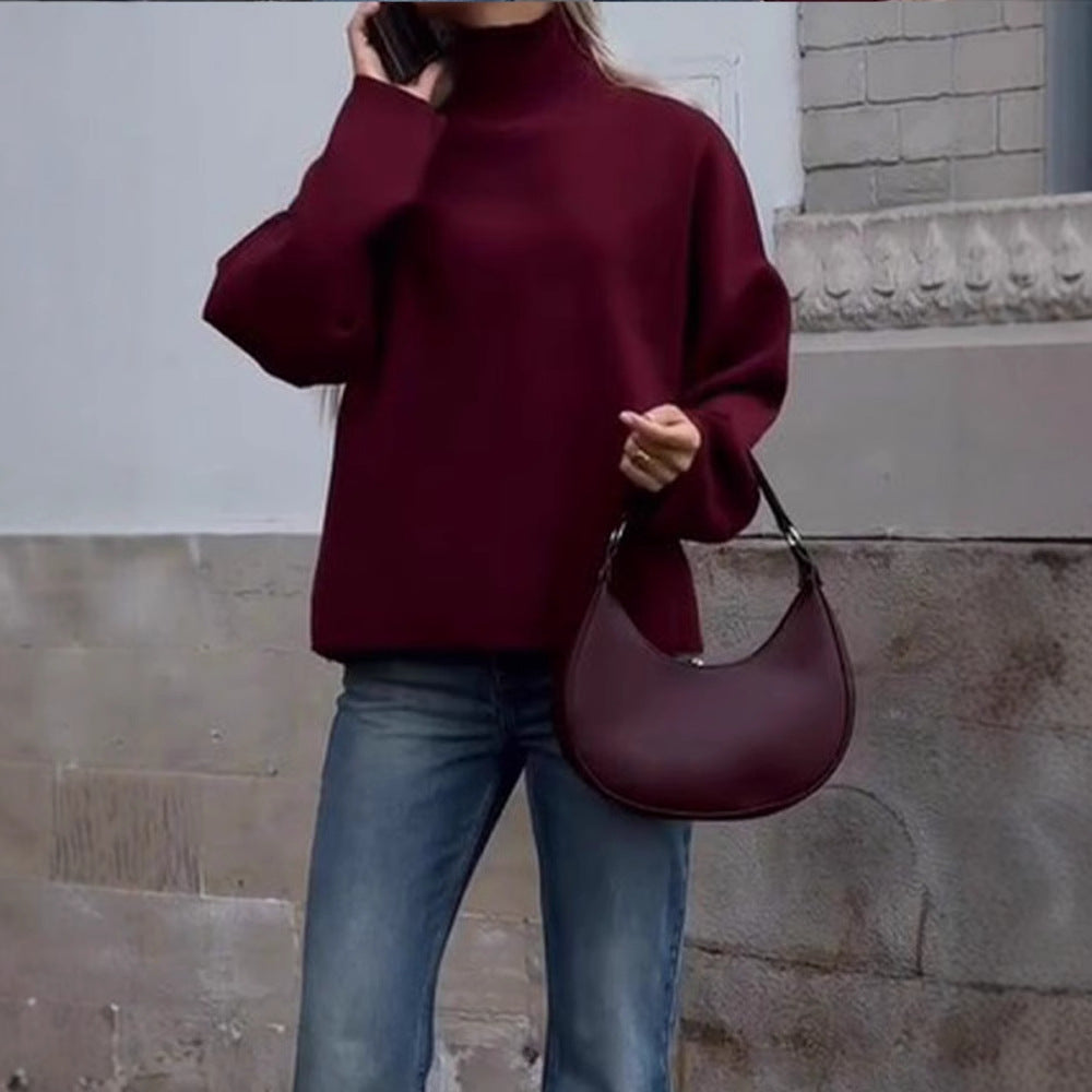 Damer oversized stickad tröja med hög krage och avslappnad passform Mirla-Eva Jonsson